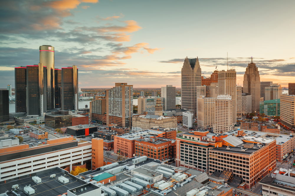 Detroit, Michigan, USA downtown skyline from above at dusk.