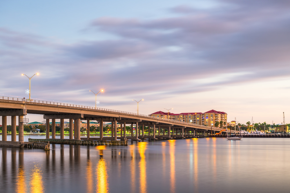 Bradenton, Florida, USA downtown on the Manatee River at dusk.