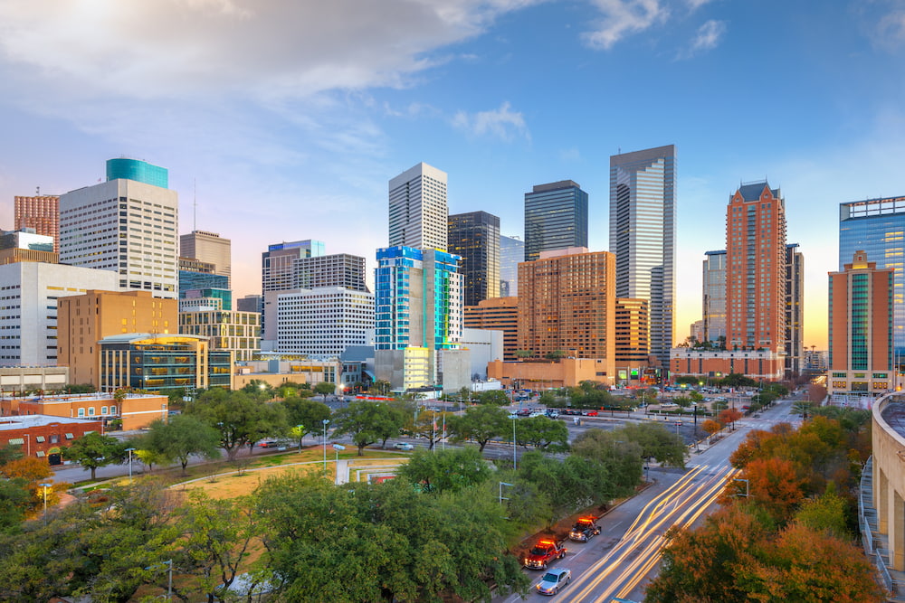 Houston, Texas, USA downtown park and skyline in the morning.